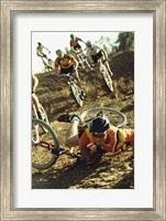 Framed Young man falling off his bicycle in a race