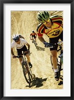 Framed Group of people riding bicycles in a race