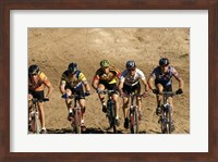 Framed Group of people riding bicycles in a race