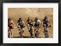 Framed Group of people riding bicycles in a race