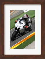 Framed Garry McCoy riding the Ilmor X3 MotoGP