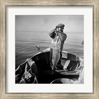 Framed Hauling in a cod aboard a Portuguese fishing dory off Cape Cod, Massachusetts