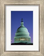 Framed Capitol Building lit up at night, Washington D.C., USA