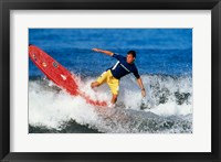 Surfing in the water Framed Print