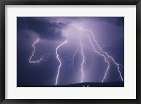 Framed Lightning bolts striking the earth