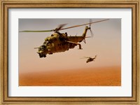 Framed Afghan Air Corps Mi-35 helicopters