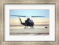 Framed AH-1 Cobra helicopter