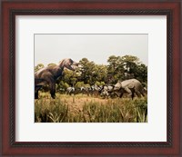 Framed Tyrannosaur standing in front of a group of triceratops in a field