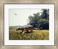 Framed Ankylosaur walking in a field and a pteranodon flying in the sky