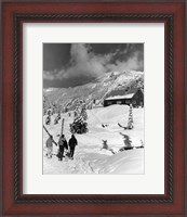 Framed USA, Washington state, three people carrying their skis