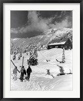 Framed USA, Washington state, three people carrying their skis