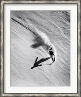 Framed High angle view of a man skiing downhill