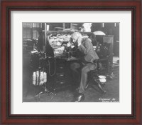 Framed Thomas Alva Edison using his dicatating machine