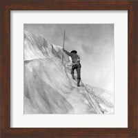 Framed Washington - Mount Rainier Guide cutting steps on ice slope near summit