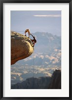 Framed Two hikers with ropes at the edge of a cliff 2