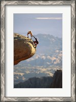 Framed Two hikers with ropes at the edge of a cliff 2