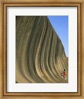 Framed Person climbing Wave Rock, Western Australia, Australia