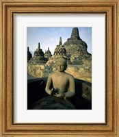 Framed Buddha statue in front of a temple, Borobudur Temple, Java, Indonesia