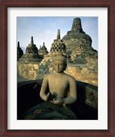 Framed Buddha statue in front of a temple, Borobudur Temple, Java, Indonesia