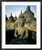 Framed Buddha statue in front of a temple, Borobudur Temple, Java, Indonesia