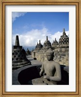 Framed Buddha statue in front of a temple, Borobudur Temple, Java, Indonesia