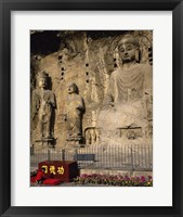 Framed Buddha Statue in a Cave, Longmen Caves, Luoyang, China with Flowers