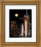 Framed Space Shuttle Discovery under a Full Moon