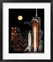 Framed Space Shuttle Discovery under a Full Moon
