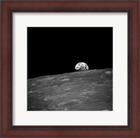 Framed first photograph taken by humans of Earthrise during Apollo 8.