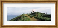 Framed Path leading towards a suspension bridge, Golden Gate Bridge, San Francisco, California, USA