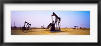 Framed Oil wells in oil field, California State Route 46, California, USA