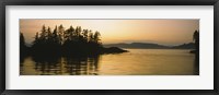 Framed Silhouette of trees in an island, Frederick Sound, Alaska, USA