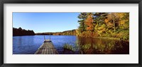 Framed Fall colors along a New England lake, Goshen, Hampshire County, Massachusetts, USA