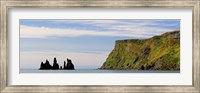 Framed Basalt rock formations in the sea, Vik, Iceland