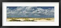 Framed Clouds over the beach with California Lighthouse in the background, Aruba