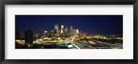 Framed Buildings lit up at night in a city, Minneapolis, Hennepin County, Minnesota, USA