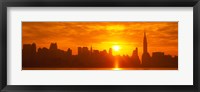 Framed Birght Orange Sky and Sun Behind the New York City Skyline