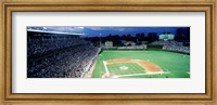 Framed Cubs baseball game under flood lights, USA, Illinois, Chicago