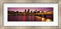 Framed Skyscrapers lit up at sunset, Willamette River, Portland, Oregon, USA