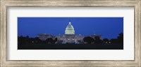 Framed Government building lit up at dusk, Capitol Building, Washington DC, USA