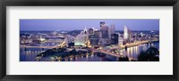 Framed Buildings in a city lit up at dusk, Pittsburgh, Allegheny County, Pennsylvania, USA