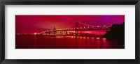 Framed Suspension bridge lit up at night, Bay Bridge, San Francisco, California, USA