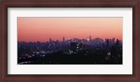 Framed High angle view of buildings lit up at dusk, Manhattan, New York City, New York State, USA