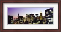 Framed Buildings lit up at dusk, Manhattan