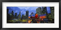Framed Low angle view of buildings lit up at night, Millennium Park, Chicago, Illinois, USA