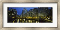 Framed Low angle view of buildings lit up at night, Chicago River, Chicago, Illinois, USA