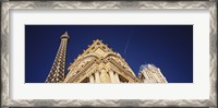 Framed Low angle view of a building in front of a replica of the Eiffel Tower, Paris Hotel, Las Vegas, Nevada, USA