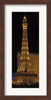 Framed Replica of the Eiffel Tower lit up at night, Paris Las Vegas, Las Vegas, Nevada, USA