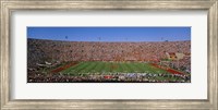 Framed High angle view of a football stadium full of spectators, Los Angeles Memorial Coliseum, City of Los Angeles, California, USA