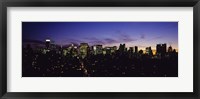Framed Skyscrapers in a city lit up at night, Manhattan, New York City, New York State, USA